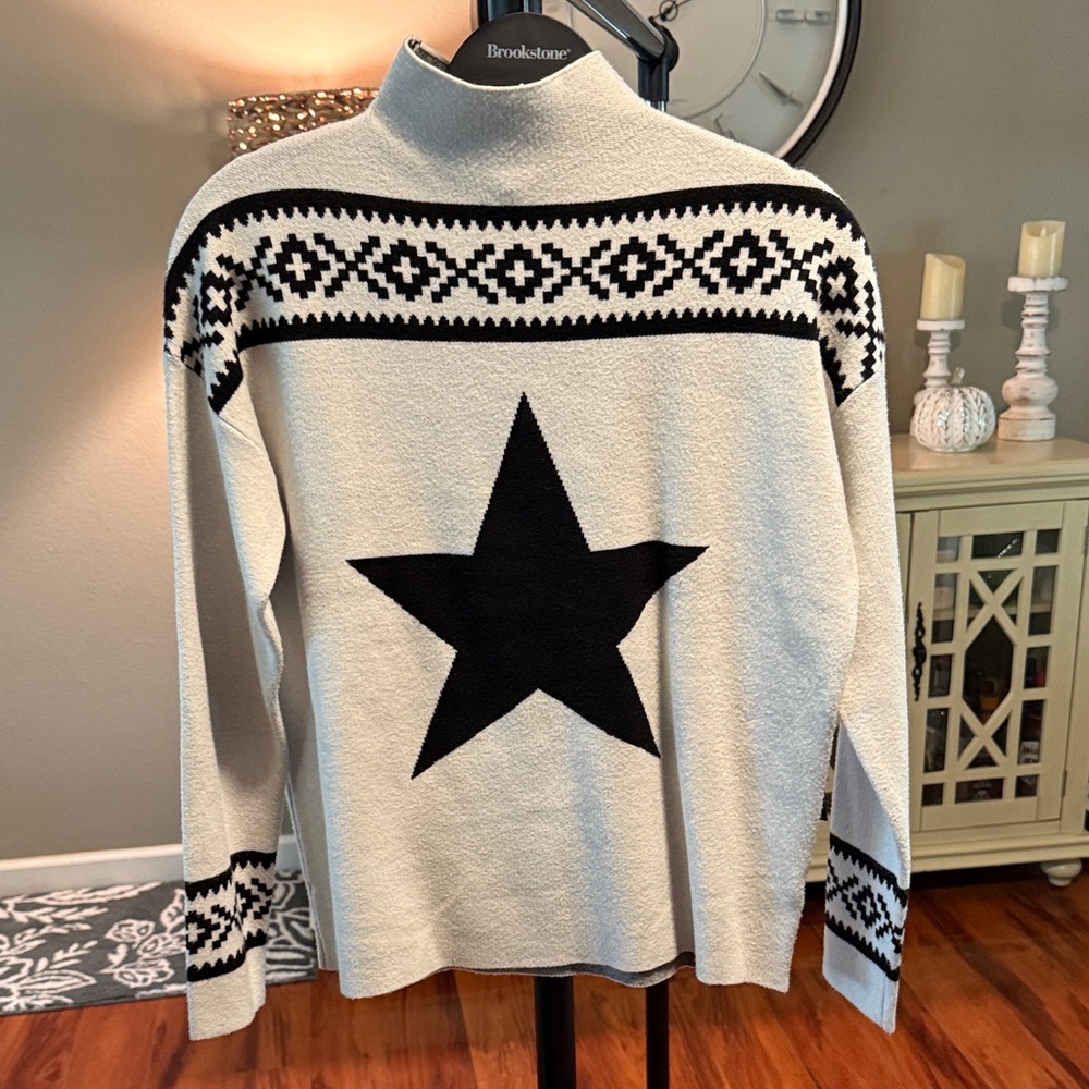 Blackstone Cream Turtleneck Sweater with Black Star Design
